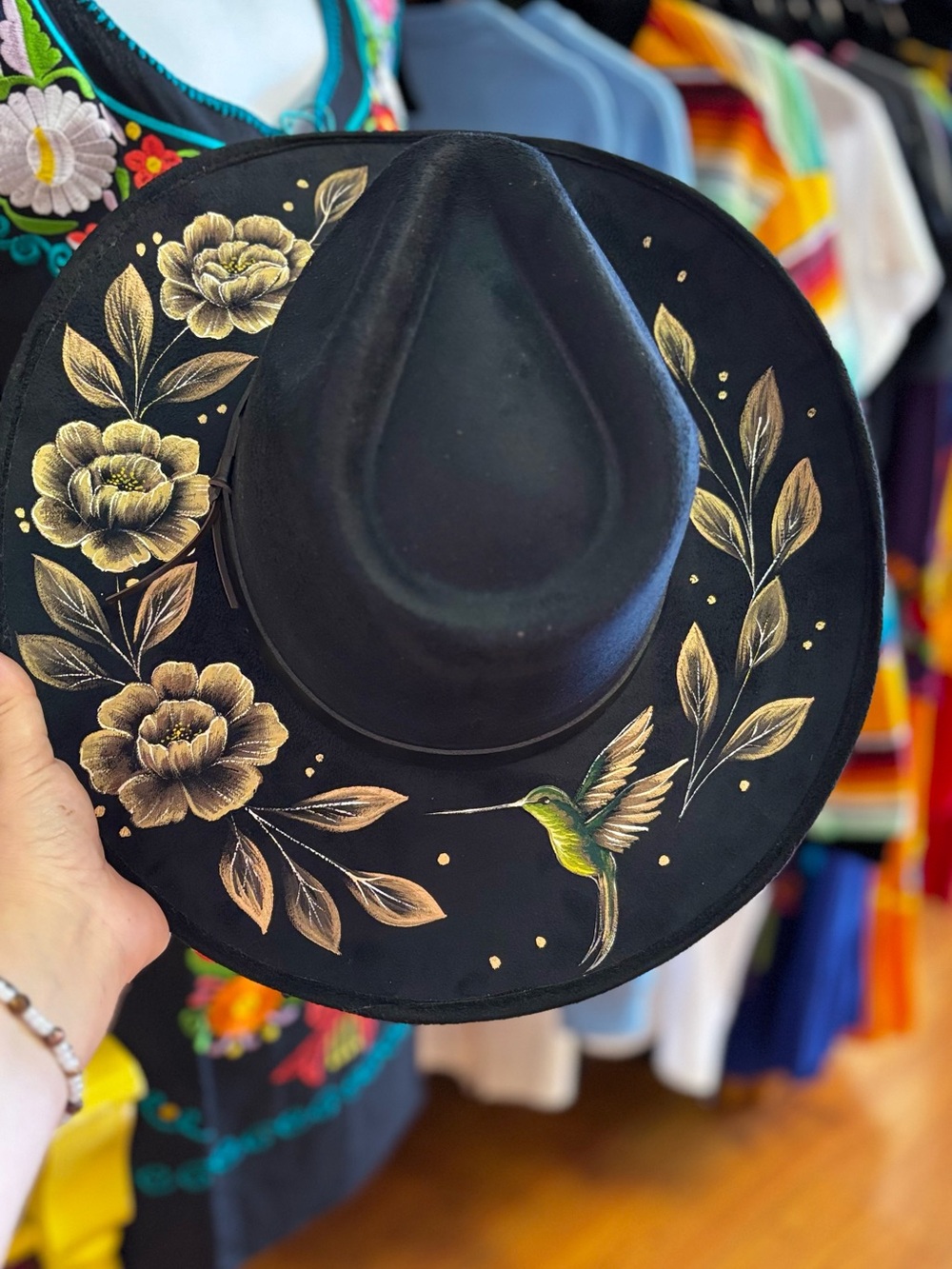 Black Felt Hat with Gold Floral Accents and Green Hummingbird